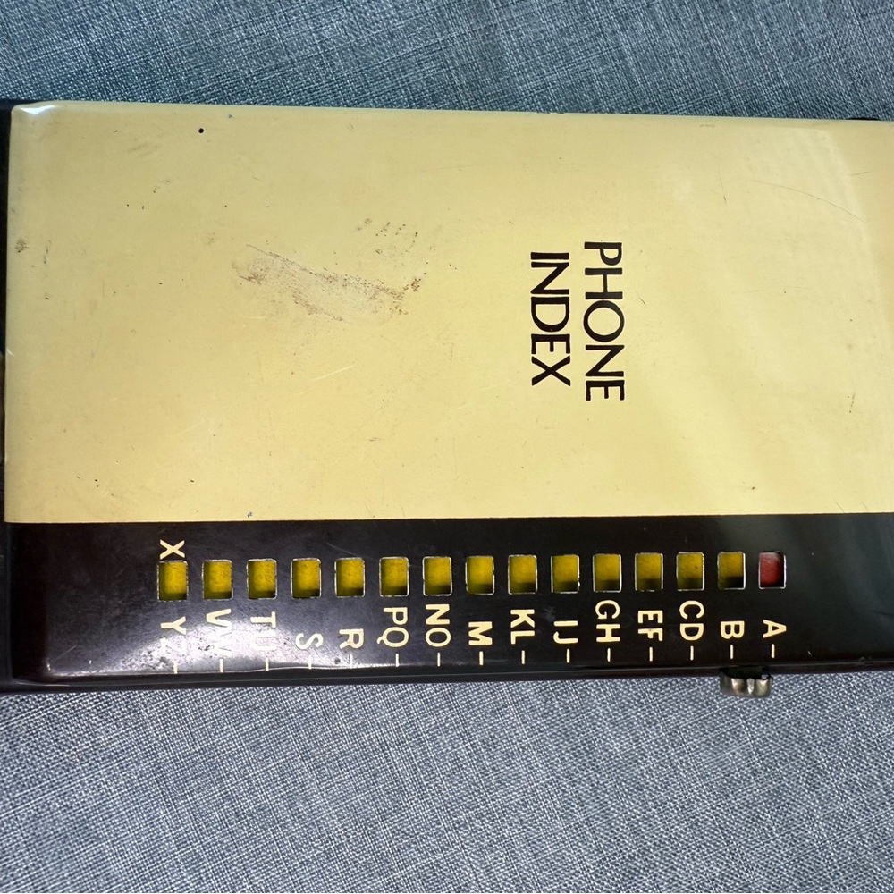 Source Unknown Yellow and Black Phone Index